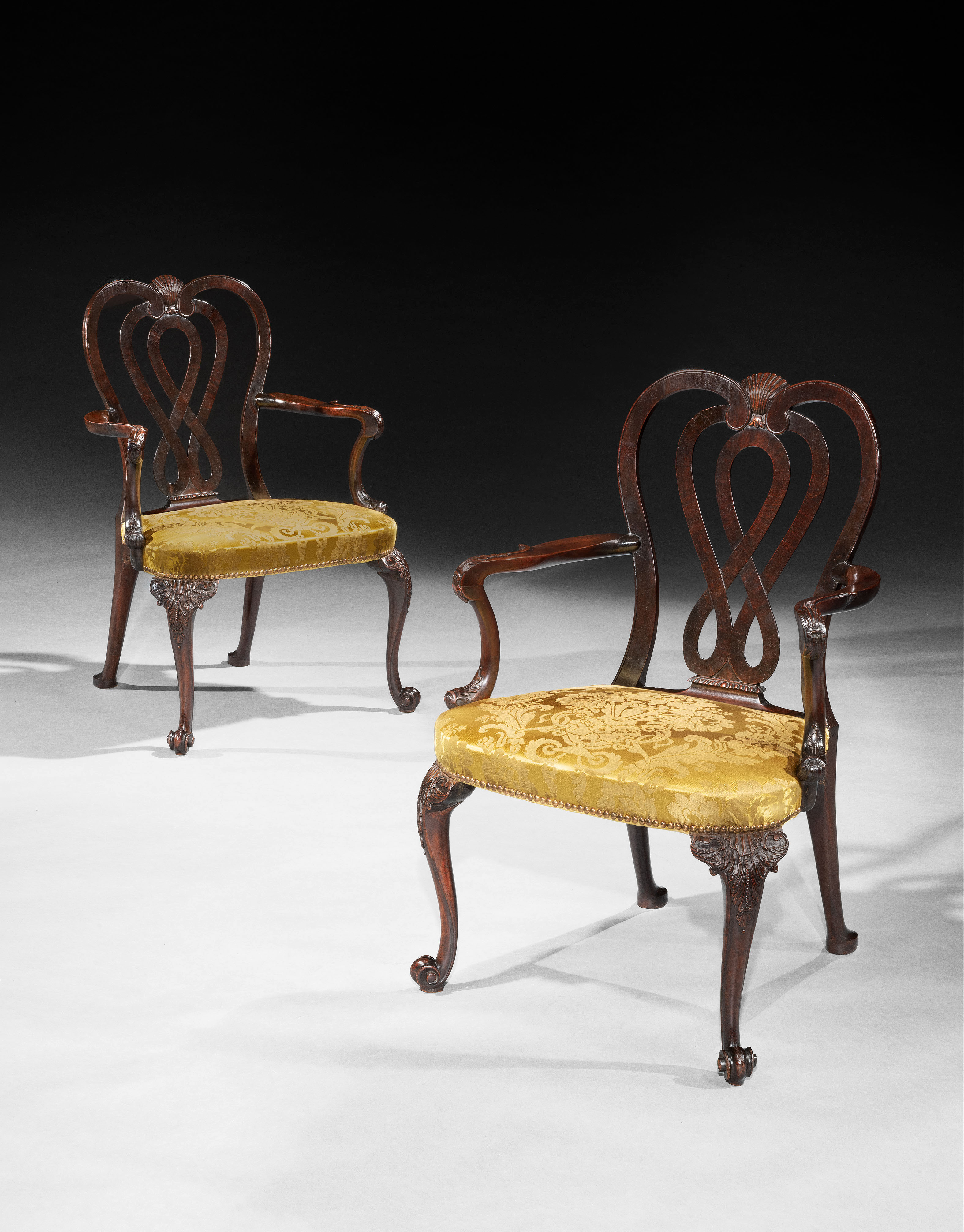 A PAIR OF GEORGE III MAHOGANY ARMCHAIRS